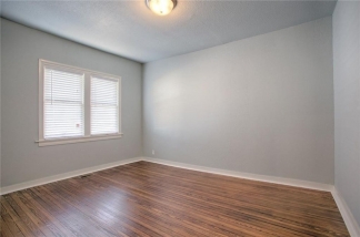 Craftsman Style Bungalow Within Walking Distance to the Plaza District!
