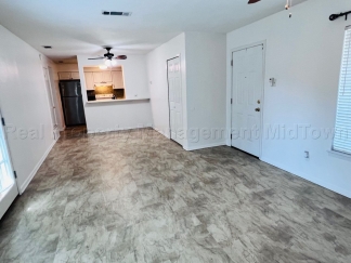 Charming 2 bedroom 1-bathroom Duplex unit features a prime location