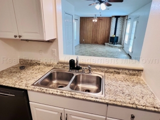 Charming 2 bedroom 1-bathroom Duplex unit features a prime location
