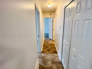 Charming 2 bedroom 1-bathroom Duplex unit features a prime location