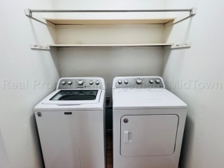 Charming 2 bedroom 1-bathroom Duplex unit features a prime location