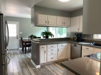 Fantastic Renovated Residence, Large Yard, Back Deck, and Garage!  Apply NOW for August Move-In!