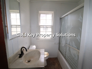 1 BR 1 BA Duplex with Basement and Garage NO PETS. (NO SECTION 8)