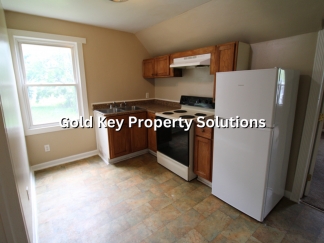 Cute 1 BR 1 BA Upstairs Apartment with Water and Sewer Included! NO PETS. (SECTION 8 APPROVED)