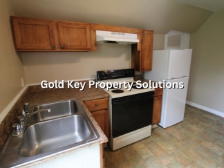 Cute 1 BR 1 BA Upstairs Apartment with Water and Sewer Included! NO PETS. (SECTION 8 APPROVED)