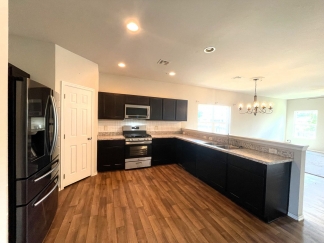 Exceptional Home In The Village! MOVE IN SPECIAL HALF OFF FIRST FULL MONTHS RENT!