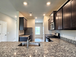 Presenting a newly constructed 5-bedroom, 3-bathroom home, ready for you to move in! $500 OFF FIRST FULL MONTHS RENT!