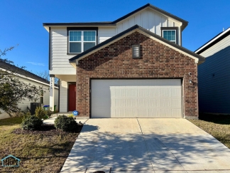 Stunning two-story residence featuring 4 spacious bedrooms and 3 well-appointed bathrooms!