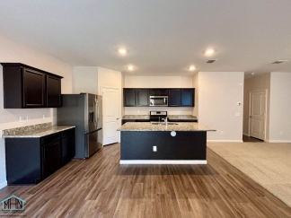 Stunning two-story residence featuring 4 spacious bedrooms and 3 well-appointed bathrooms!
