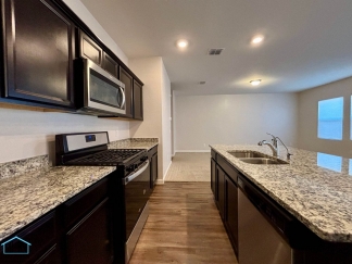 Stunning two-story residence featuring 4 spacious bedrooms and 3 well-appointed bathrooms!