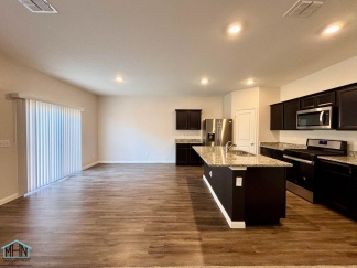 Stunning two-story residence featuring 4 spacious bedrooms and 3 well-appointed bathrooms!