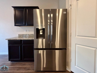 Stunning two-story residence featuring 4 spacious bedrooms and 3 well-appointed bathrooms!