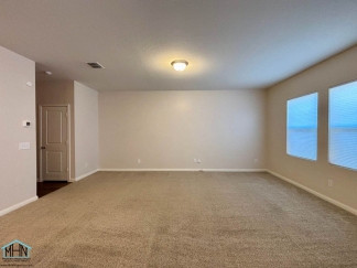 Stunning two-story residence featuring 4 spacious bedrooms and 3 well-appointed bathrooms!
