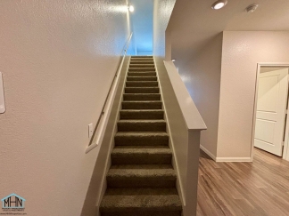 Stunning two-story residence featuring 4 spacious bedrooms and 3 well-appointed bathrooms!
