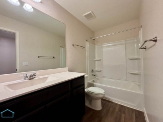 Stunning two-story residence featuring 4 spacious bedrooms and 3 well-appointed bathrooms!