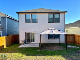 Stunning two-story residence featuring 4 spacious bedrooms and 3 well-appointed bathrooms!