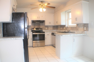 Charming Brick Home with Modern Comforts!