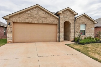 **MOVE IN SPECIAL!! 50% OFF First Months Rent!!** Stunning 4-Bedroom Home in the Heart of Mustang