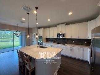 Spacious Upgraded Home with Pond View in K-Bar Ranch