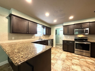 Minutes from Tinker AFB – Cozy 3BR Home with Garage & Security Features!
