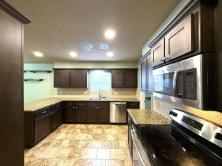Minutes from Tinker AFB – Cozy 3BR Home with Garage & Security Features!