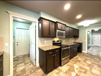 Minutes from Tinker AFB – Cozy 3BR Home with Garage & Security Features!
