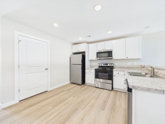 Modern 2-Bed, 1-Bath Apartment in Yorktown – Brand New Build With Attached Garage and Private Driveway!