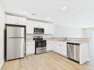 Modern 2-Bed, 1-Bath Apartment in Yorktown – Brand New Build With Attached Garage and Private Driveway!