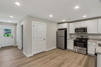 Modern 2-Bed, 1-Bath Apartment in Yorktown – Brand New Build With Attached Garage and Private Driveway!