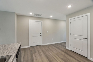 Modern 2-Bed, 1-Bath Apartment in Yorktown – Brand New Build With Attached Garage and Private Driveway!