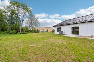 Modern 2-Bed, 1-Bath Apartment in Yorktown – Brand New Build With Attached Garage and Private Driveway!