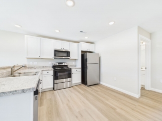 Modern 2-Bed, 2-Bath Apartment in Yorktown – Brand New Build With Attached Garage and Private Driveway!