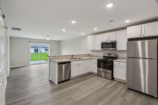 Modern 2-Bed, 2-Bath Apartment in Yorktown – Brand New Build With Attached Garage and Private Driveway!