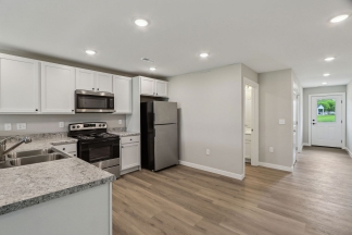 Modern 2-Bed, 2-Bath Apartment in Yorktown – Brand New Build With Attached Garage and Private Driveway!