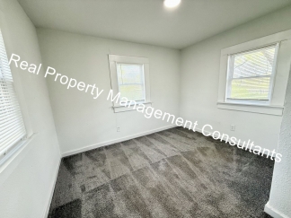 Spacious 4 Bedroom, 2 Bath Home with Outbuilding Storage and Fantastic Outdoor Living!
