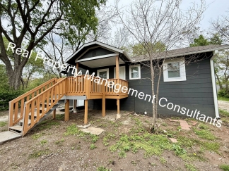 Spacious 4 Bedroom, 2 Bath Home with Outbuilding Storage and Fantastic Outdoor Living!