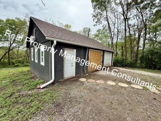 Spacious 4 Bedroom, 2 Bath Home with Outbuilding Storage and Fantastic Outdoor Living!