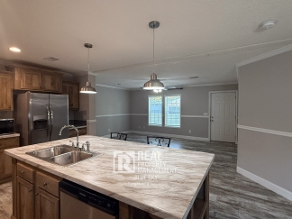 SPACIOUS 4 BEDROOM HOME WITH MODERN FEATURES AND FLEXIBLE OUTDOOR SPACE