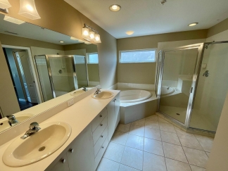 Spacious, first-floor, end-unit condominium for rent in luxurious Heritage Oaks. 2bed, 2bath, den, garage.