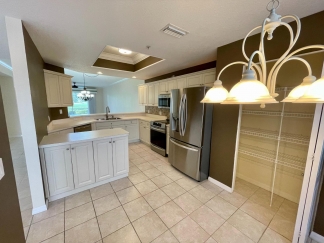 Spacious, first-floor, end-unit condominium for rent in luxurious Heritage Oaks. 2bed, 2bath, den, garage.