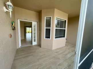 Spacious, first-floor, end-unit condominium for rent in luxurious Heritage Oaks. 2bed, 2bath, den, garage.