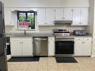 North Raleigh Move-In Ready Condo, On Ground Floor With Secluded Patio!