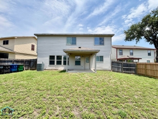 A Residence of Exceptional Space and Comfort Nestled in a Serene Neighborhood, Conveniently Located to USAA, the Medical Center and IH 10!