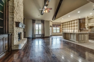 NOW SHOWING! Fall Special $500 Off the First Month's Rent! Custom Yukon Home with Indoor & Outdoor Fireplaces + Bonus Room!-AVAILABLE NOW!