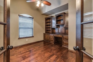 NOW SHOWING! Fall Special $500 Off the First Month's Rent! Custom Yukon Home with Indoor & Outdoor Fireplaces + Bonus Room!-AVAILABLE NOW!