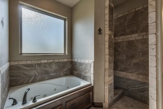 NOW SHOWING! Fall Special $500 Off the First Month's Rent! Custom Yukon Home with Indoor & Outdoor Fireplaces + Bonus Room!-AVAILABLE NOW!