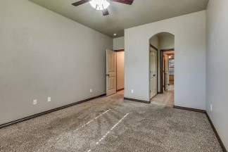 NOW SHOWING! Fall Special $500 Off the First Month's Rent! Custom Yukon Home with Indoor & Outdoor Fireplaces + Bonus Room!-AVAILABLE NOW!