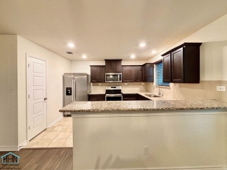 Welcome and Discover this thoughtfully designed Home! Experience Modern Living, Space & Comfort and Gracious Entertaining!