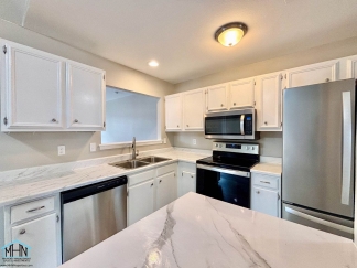 Modern Comfort meets Serene Living - A Stunning 4-bedroom, 2-bath Residential Oasis!