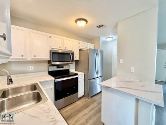 Modern Comfort meets Serene Living - A Stunning 4-bedroom, 2-bath Residential Oasis!